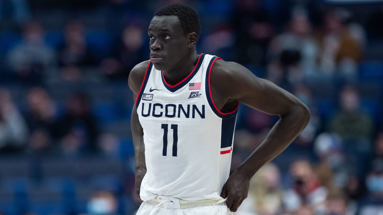 HARTFORD, CT - JANUARY 18: UConn Huskies forward Akok Akok (11) checks into the game during the mens college basketball game between the Butler Bulldogs and UConn Huskies on January 18, 2022, at XL Center in Hartford, CT.