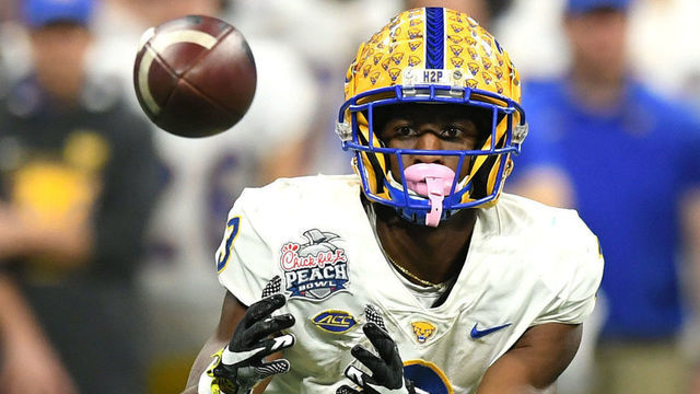 ATLANTA, GEORGIA - DECEMBER 30: Jordan Addison #3 of the Pittsburgh Panthers makes a catch against the Michigan State Spartans at Mercedes-Benz Stadium on December 30, 2021 in Atlanta, Georgia.