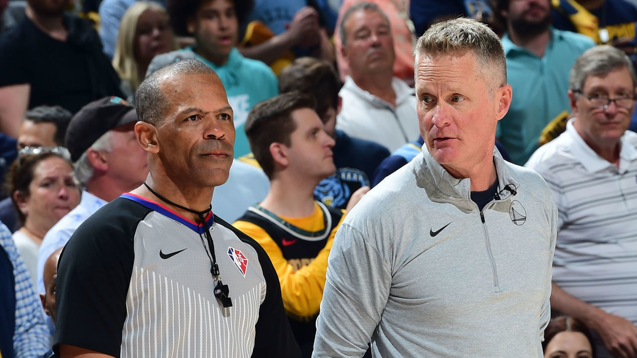 MEMPHIS, TN - MAY 3: NBA referee Eric Lewis #42 and Head Coach Steve Kerr of the Golden State Warriors look on during the game against the Memphis Grizzlies during Game 2 of the 2022 NBA Playoffs Western Conference Semifinals on May 3, 2022 at FedExForum in Memphis, Tennessee. NOTE TO USER: User expressly acknowledges and agrees that, by downloading and or using this photograph, user is consenting to the terms and conditions of Getty Images License Agreement. Mandatory Copyright Notice: Copyright 2022 NBAE