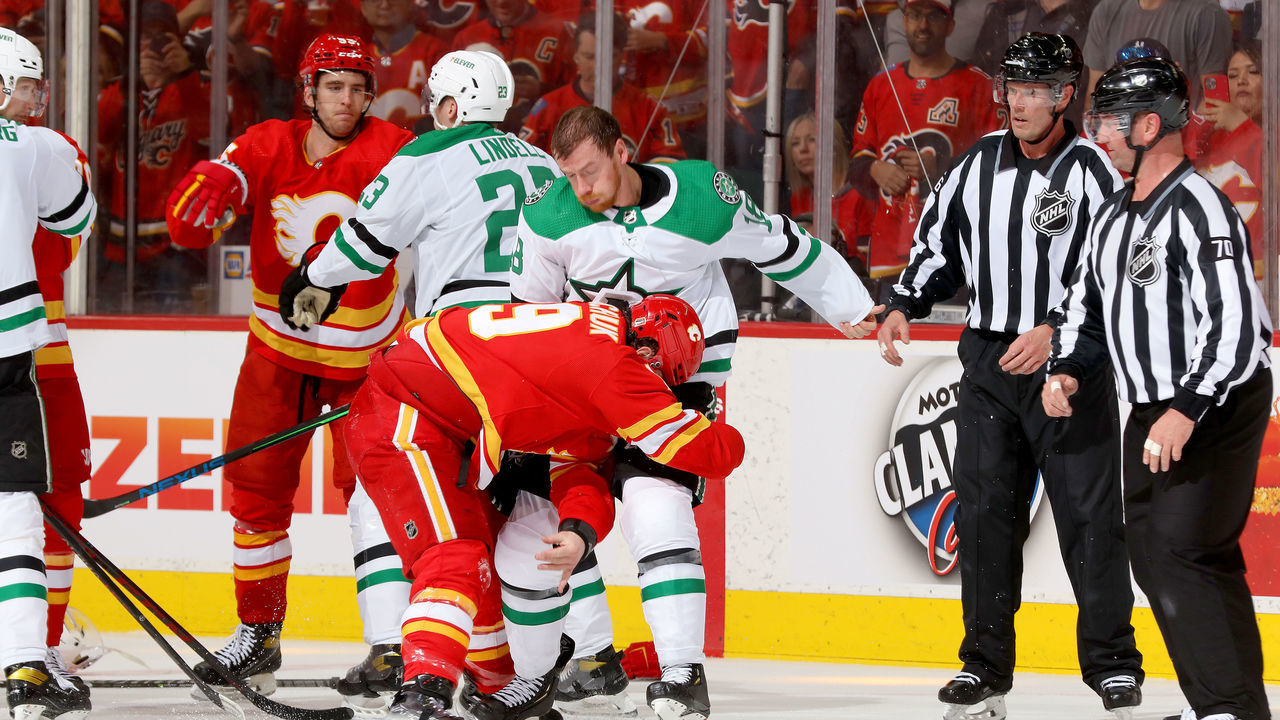 CALGARY, ALBERTA - MAY 03: Matthew Tkachuk #19 of the Calgary Flames fights Michael Raffl #18 of the Dallas Stars in Game One of the First Round of the 2022 Stanley Cup Playoffs at Scotiabank Saddledome on May 03, 2022 in Calgary, Alberta.