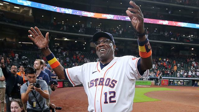 HOUSTON, TEXAS - MAY 03: Manager Dusty Baker Jr. #12 of the Houston Astros celebrates his 2000th career win after a game against Seattle Mariners at Minute Maid Park on May 03, 2022 in Houston, Texas.