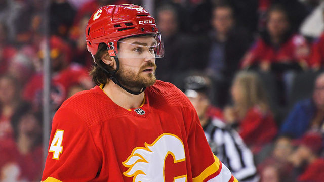 CALGARY, AB - APRIL 12: Rasmus Andersson #4 of the Calgary Flames in action against the Seattle Kraken during an NHL game at Scotiabank Saddledome on April 12, 2022 in Calgary, Alberta, Canada.