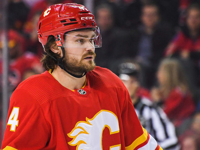 CALGARY, AB - APRIL 12: Rasmus Andersson #4 of the Calgary Flames in action against the Seattle Kraken during an NHL game at Scotiabank Saddledome on April 12, 2022 in Calgary, Alberta, Canada.
