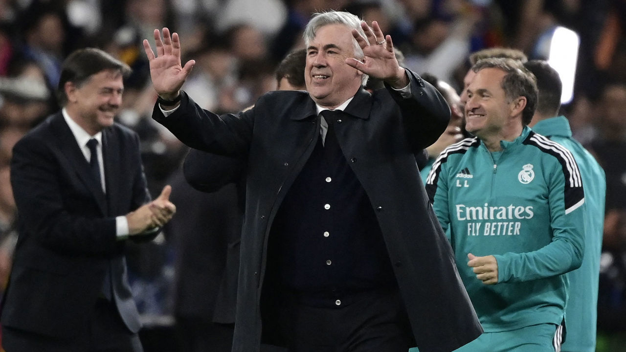Real Madrid's Italian coach Carlo Ancelotti celebrates at the end of the UEFA Champions League semi-final second leg football match between Real Madrid CF and Manchester City at the Santiago Bernabeu stadium in Madrid on May 4, 2022.