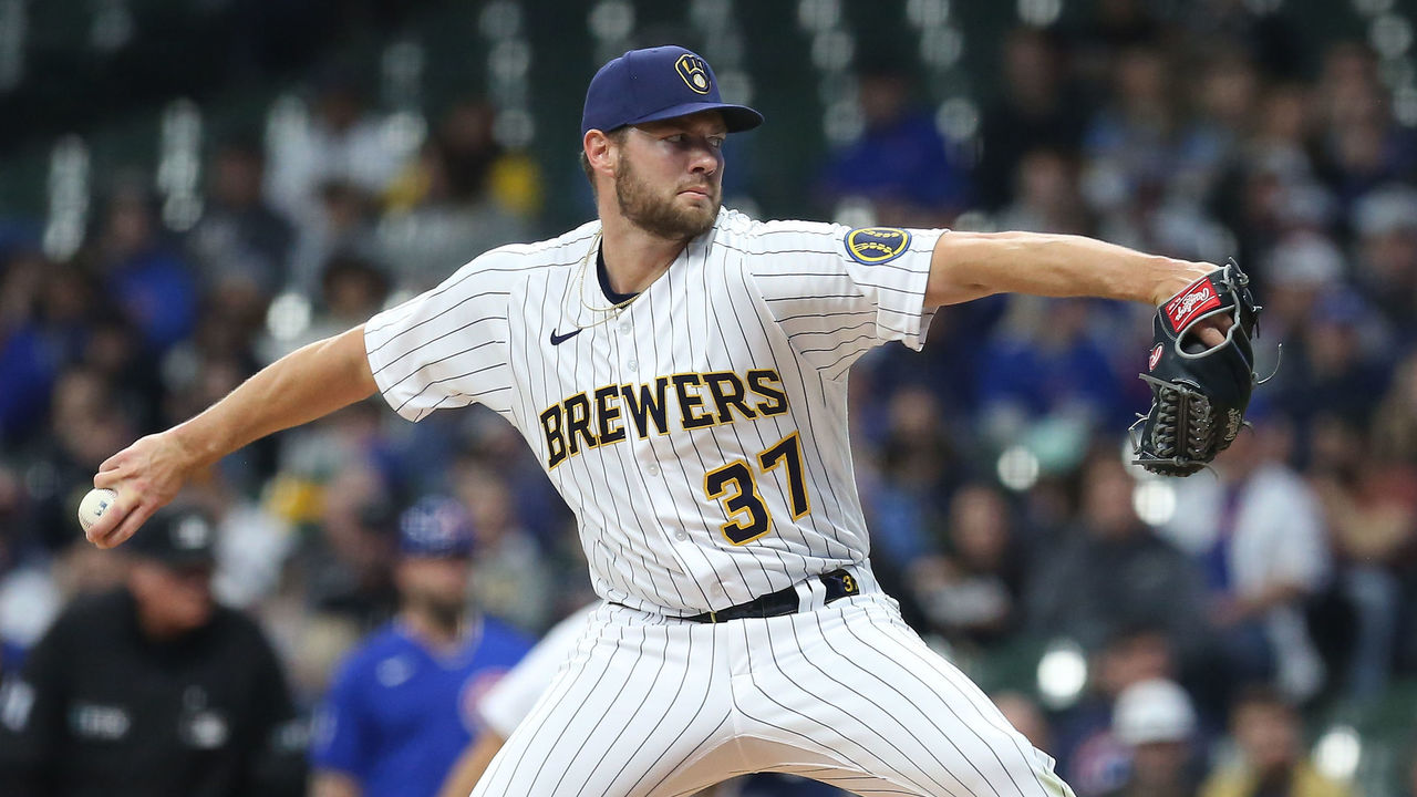 Taylor homers, Houser pitches NL Central champion Brewers past