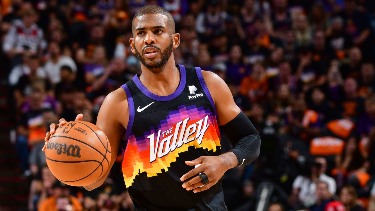 PHOENIX, AZ - MAY 4: Chris Paul #3 of the Phoenix Suns dribbles the ball against the Dallas Mavericks during Game 2 of the 2022 NBA Playoffs Western Conference Semifinals on May 4, 2022 at Footprint Center in Phoenix, Arizona. Mandatory Copyright Notice: Copyright 2022 NBAE