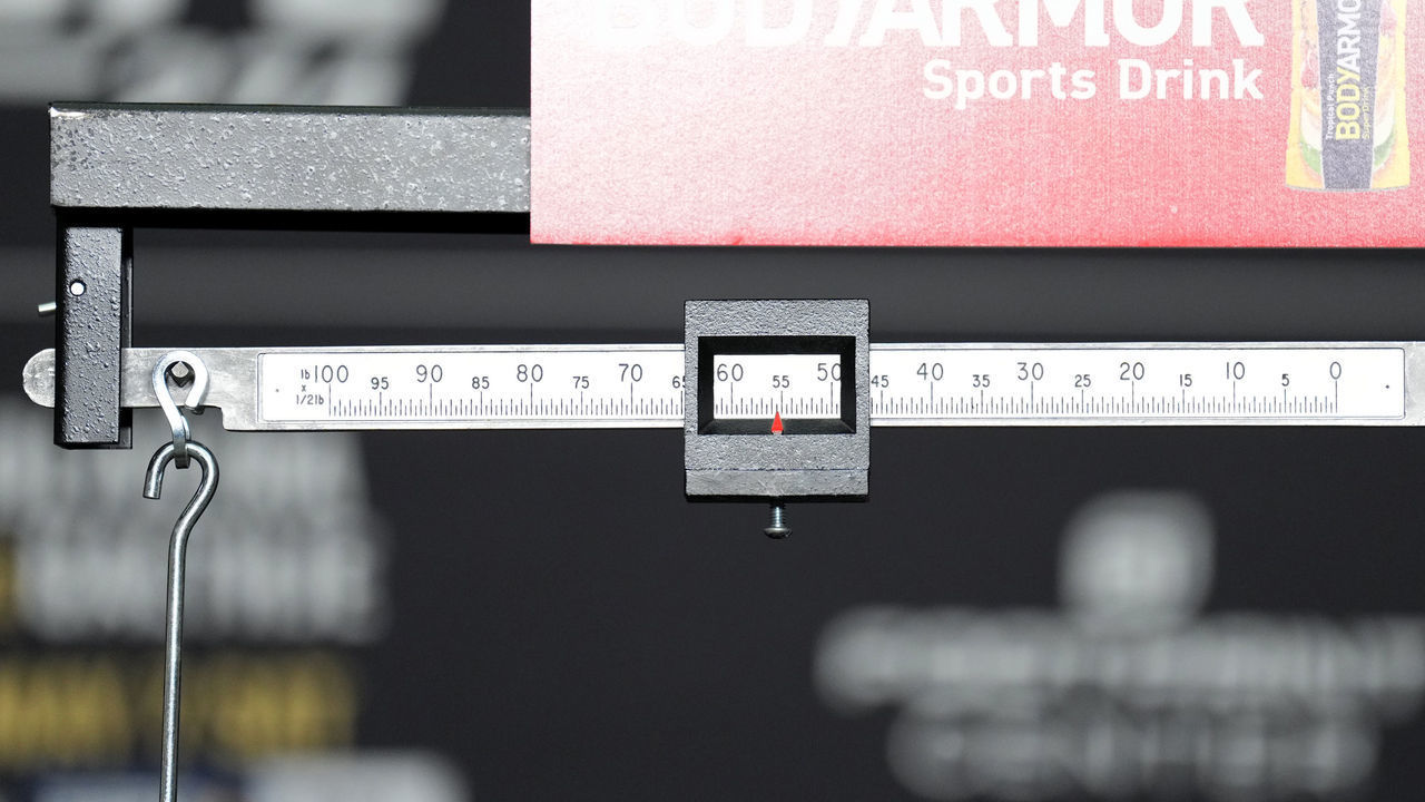 PHOENIX, ARIZONA - MAY 06: A detail view of the scale reading 155.5 pounds after Charles Oliveira of Brazil failed to make weight, vacating the UFC lightweight championship, during the UFC 274 official weigh-in at the Hyatt Regency hotel on May 06, 2022 in Phoenix, Arizona.
