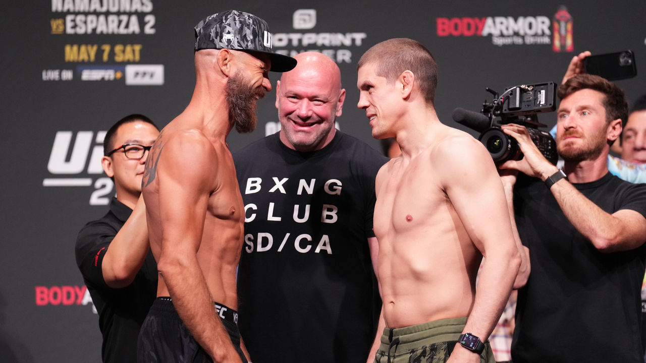 PHOENIX, ARIZONA - MAY 06: (L-R) Opponents Donald 'Cowboy' Cerrone and Joe Lauzon face off during the UFC 274 ceremonial weigh-in at the Arizona Federal Theatre on May 06, 2022 in Phoenix, Arizona.
