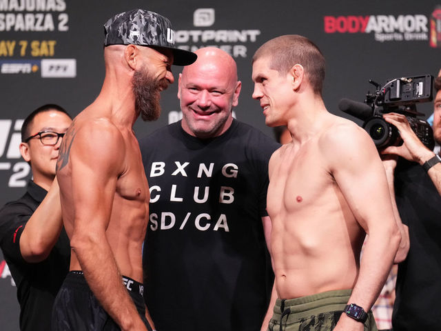PHOENIX, ARIZONA - MAY 06: (L-R) Opponents Donald 'Cowboy' Cerrone and Joe Lauzon face off during the UFC 274 ceremonial weigh-in at the Arizona Federal Theatre on May 06, 2022 in Phoenix, Arizona.