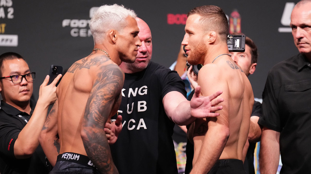 PHOENIX, ARIZONA - MAY 06: (L-R) Opponents Charles Oliveira of Brazil and Justin Gaethje face off during the UFC 274 ceremonial weigh-in at the Arizona Federal Theatre on May 06, 2022 in Phoenix, Arizona.