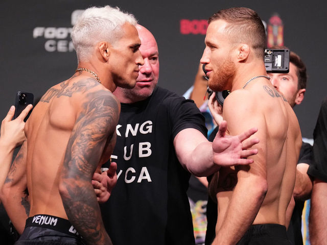 PHOENIX, ARIZONA - MAY 06: (L-R) Opponents Charles Oliveira of Brazil and Justin Gaethje face off during the UFC 274 ceremonial weigh-in at the Arizona Federal Theatre on May 06, 2022 in Phoenix, Arizona.