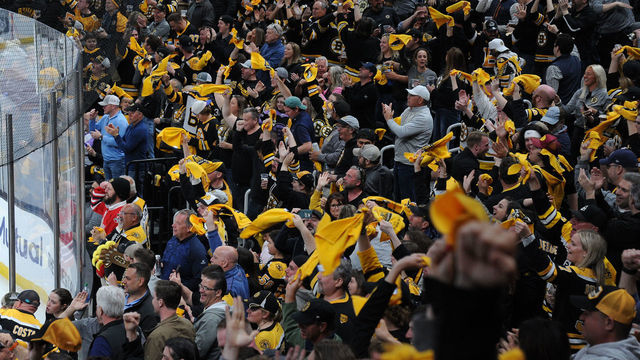 BOSTON, MA - MAY 06: Fans of the Boston Bruins wave their rally towels after the first period goal against the Carolina Hurricanes in Game Three of the First Round of the 2022 Stanley Cup Playoffs at the TD Garden on May 6, 2022 in Boston, Massachusetts.