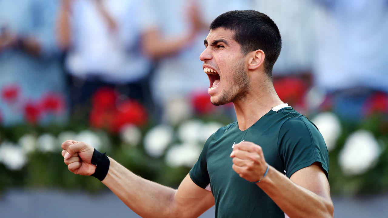 MADRID, SPAIN - MAY 07: Carlos Alcaraz of Spain celebrates after winning match point in their Men's Singles semi-finals match against Novak Djokovic of Serbia during day ten of Mutua Madrid Open at La Caja Magica on May 07, 2022 in Madrid, Spain.