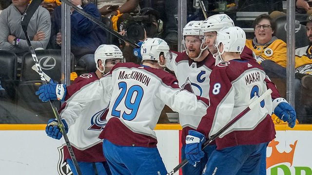 NASHVILLE, TN - MAY 7: Gabriel Landeskog #92 of the Colorado Avalanche celebrates his goal with Nathan MacKinnon #29 and Cale Makar #8 against the Nashville Predators in Game Three of the First Round of the 2022 Stanley Cup Playoffs at Bridgestone Arena on May 7, 2022 in Nashville, Tennessee.