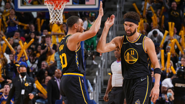 SAN FRANCISCO, CA - MAY 7: Stephen Curry #30 of the Golden State Warriors high fives Klay Thompson #11 during Game 3 of the 2022 NBA Playoffs Western Conference Semifinals on May 7, 2022 at Chase Center in San Francisco, California. NOTE TO USER: User expressly acknowledges and agrees that, by downloading and or using this photograph, user is consenting to the terms and conditions of Getty Images License Agreement. Mandatory Copyright Notice: Copyright 2022 NBAE