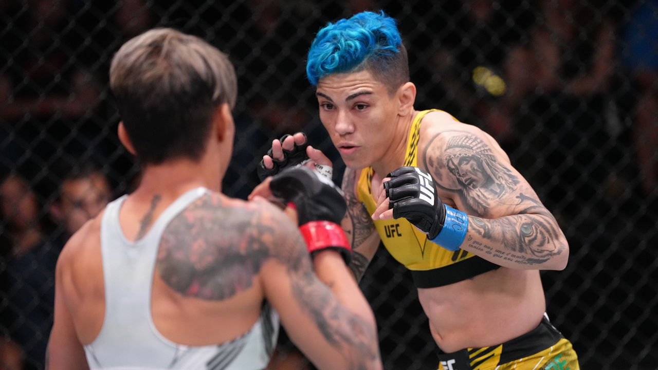 LAS VEGAS, NEVADA - APRIL 23: (R-L) Jessica Andrade of Brazil battles Amanda Lemos of Brazil in a strawweight fight during the UFC Fight Night event at UFC APEX on April 23, 2022 in Las Vegas, Nevada.