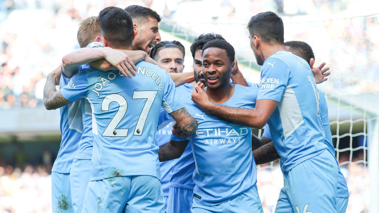 MANCHESTER, ENGLAND - MAY 08: Raheem Sterling of Manchester City celebrates with teammates after scoring his side's first goal during the Premier League match between Manchester City and Newcastle United at Etihad Stadium on May 08, 2022 in Manchester, England.