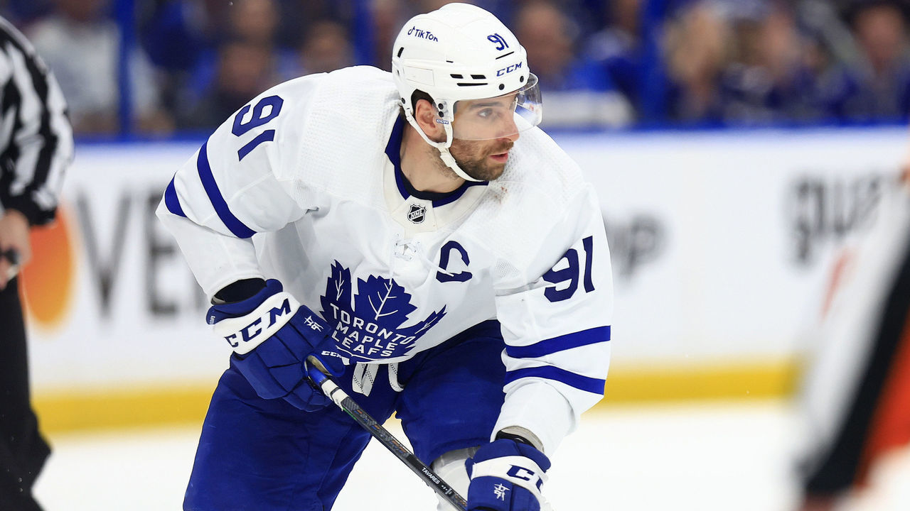 TAMPA, FLORIDA - MAY 08: John Tavares #91 of the Toronto Maple Leafs looks to pass in the third period during Game Four of the First Round of the 2022 Stanley Cup Playoffs against the Tampa Bay Lightning at Amalie Arena on May 08, 2022 in Tampa, Florida.