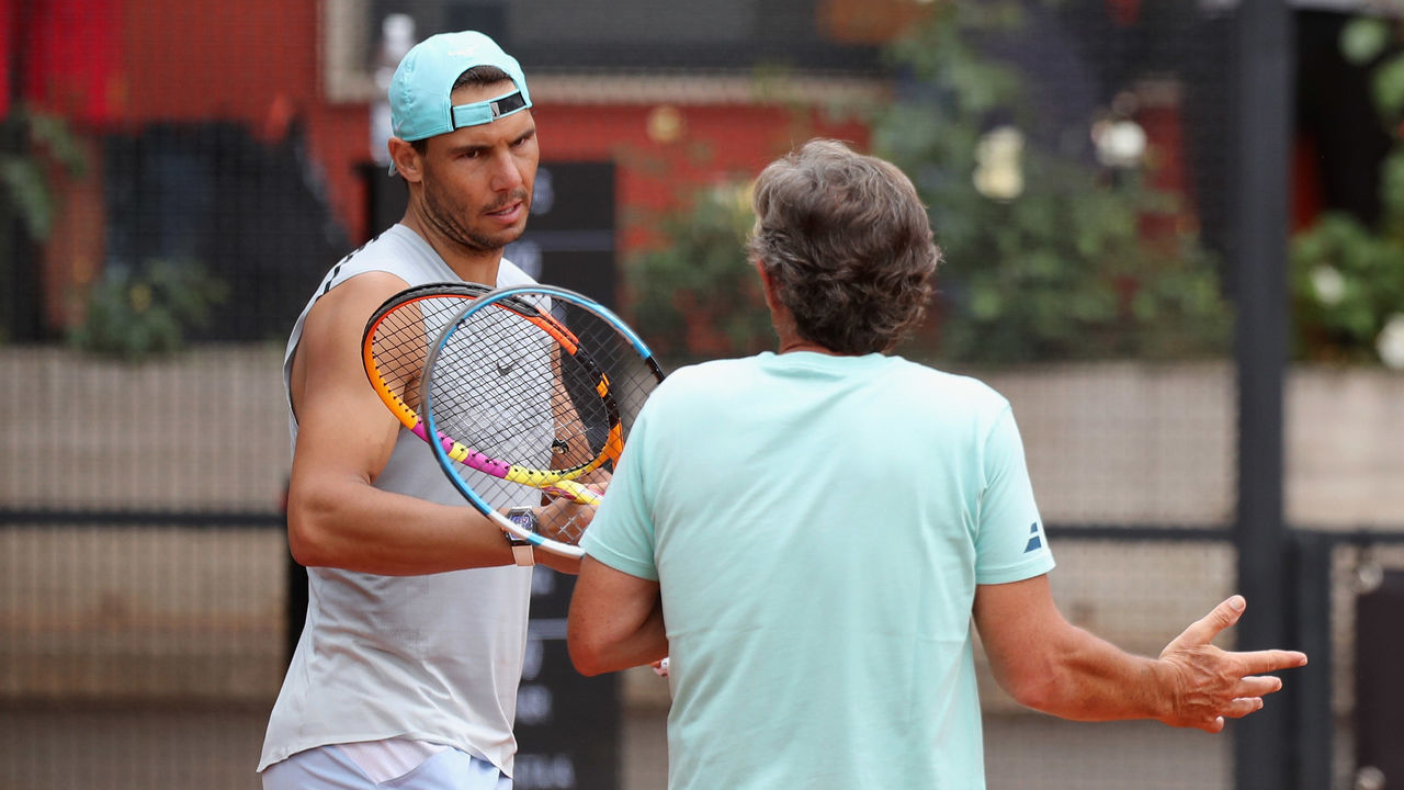ROME, ITALY - MAY 08: Rafael Nadal of Spain speaks with his head coach during the training at the Internazionali BNL D'Italia at Foro Italico on May 8, 2022 in Rome, Italy.