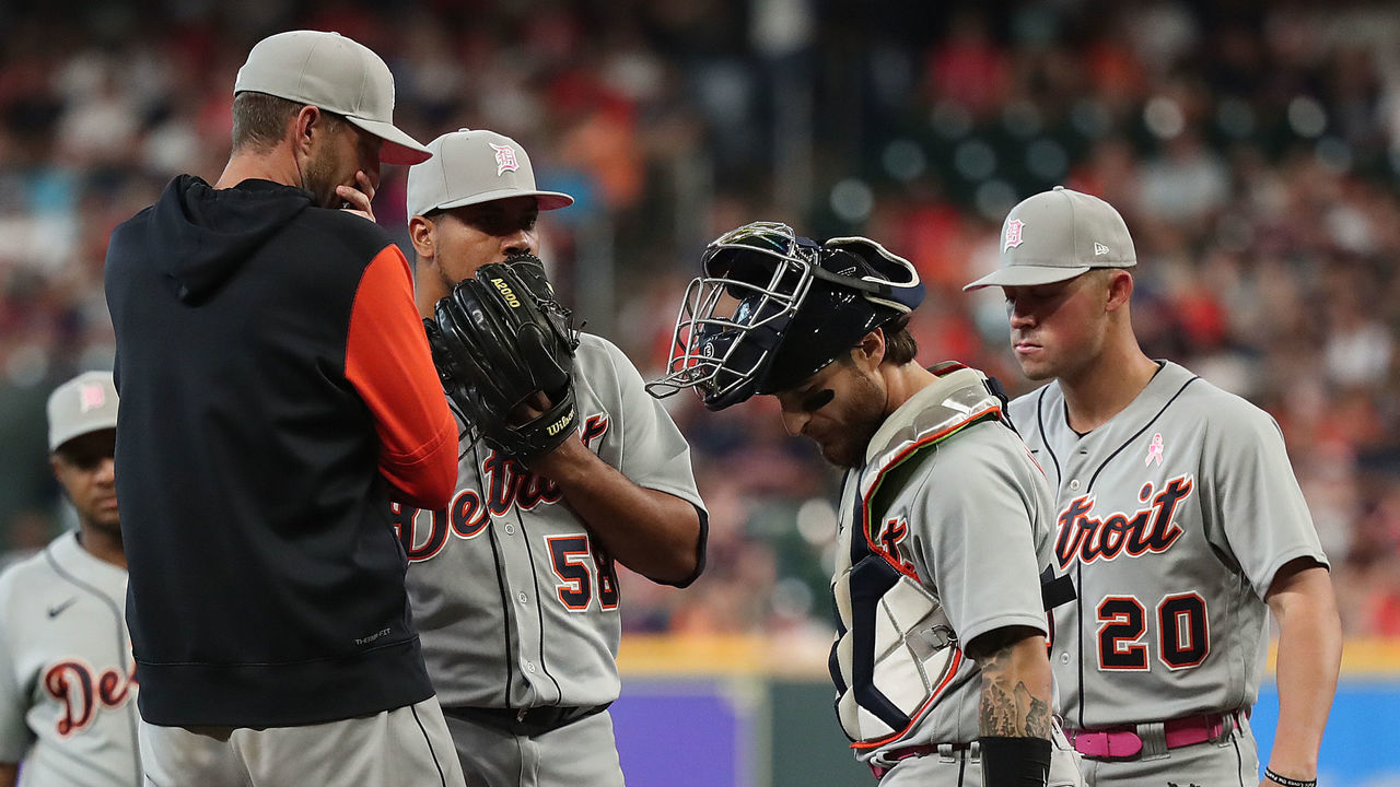 HOUSTON, TEXAS - MAY 08: Pitching coach Chris Fetter #52 of the Detroit Tigers chats with Wily Peralta #58 in the first inning against the Houston Astros at Minute Maid Park on May 08, 2022 in Houston, Texas.