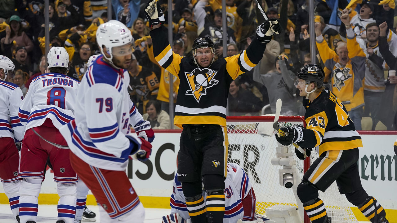 PITTSBURGH, PA - MAY 07: Pittsburgh Penguins center Jeff Carter (77) reacts after scoring a goal past New York Rangers goaltender Igor Shesterkin (31) during the first period in Game Three of the First Round in the 2022 NHL Stanley Cup Playoffs between the New York Rangers and the Pittsburgh Penguins on May 7, 2022, at PPG Paints Arena in Pittsburgh, PA.