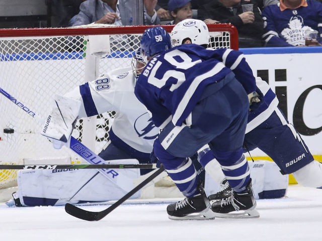 TORONTO, ON - May 4 In second period action, Michael Bunting (58) of the Toronto Maple Leafs drops in a goal past Andrei Vasilevskiy (88) of the Tampa Bay Lightning The Toronto Maple Leafs took on the Tampa Bay Lightning in NHL hockey action at the Scotiabank Arena in Toronto. This is the second game of the first round of playoffs May 4 2022 (Richard Lautens/Toronto Star via Getty Images)