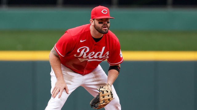 CINCINNATI, OHIO - MAY 07: Mike Moustakas #9 of the Cincinnati Reds plays third base in the fifth inning against the Pittsburgh Pirates during game one of a doubleheader at Great American Ball Park on May 07, 2022 in Cincinnati, Ohio.