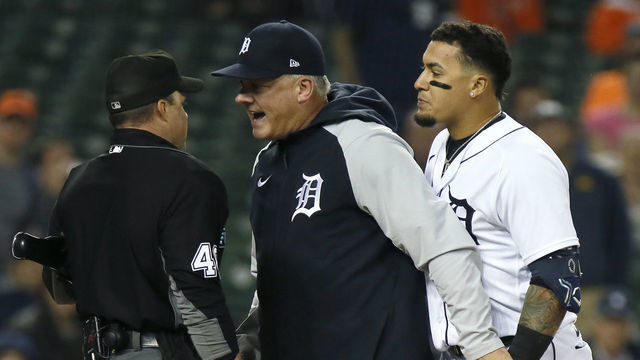 DETROIT, MI - MAY 9: Manager A.J. Hinch #14 of the Detroit Tigers gets between Javier Baez #28 and home plate umpire Nick Mahrley #48 after Baez was ejected for arguing after being called out on strikes during the ninth inning of a game against the Oakland Athletics at Comerica Park on May 9, 2022, in Detroit, Michigan.