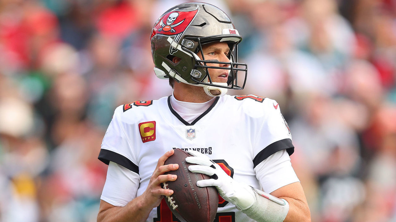 TAMPA, FLORIDA - JANUARY 16: Tom Brady #12 of the Tampa Bay Buccaneers throws a pass against the Philadelphia Eagles in the first half of the NFC Wild Card Playoff game at Raymond James Stadium on January 16, 2022 in Tampa, Florida.