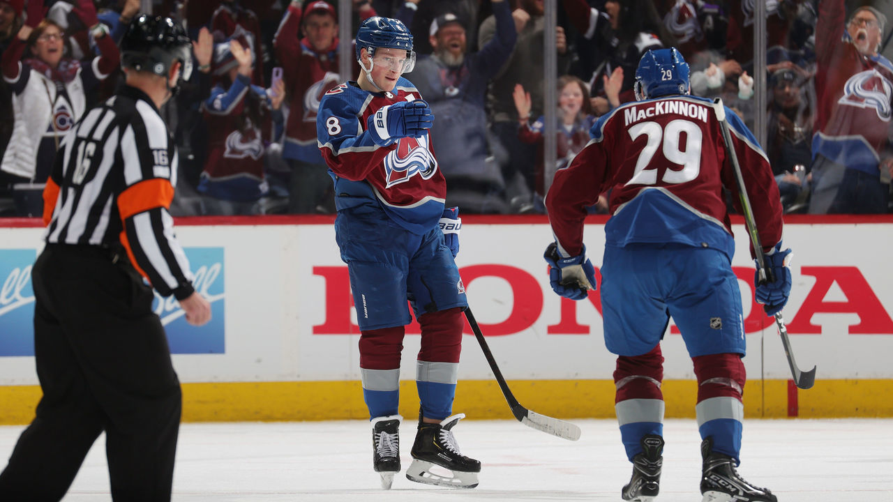 DENVER, COLORADO - APRIL 13: Cale Makar #8 and Nathan MacKinnon #29 of the Colorado Avalanche celebrate a goal against the Los Angeles Kings at Ball Arena on April 13, 2022 in Denver, Colorado.