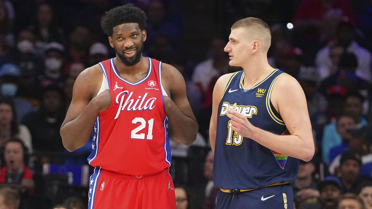 PHILADELPHIA, PA - MARCH 14: Joel Embiid #21 of the Philadelphia 76ers talks to Nikola Jokic #15 of the Denver Nuggets at the Wells Fargo Center on March 14, 2022 in Philadelphia, Pennsylvania. The Nuggets defeated the 76ers 114-110.
