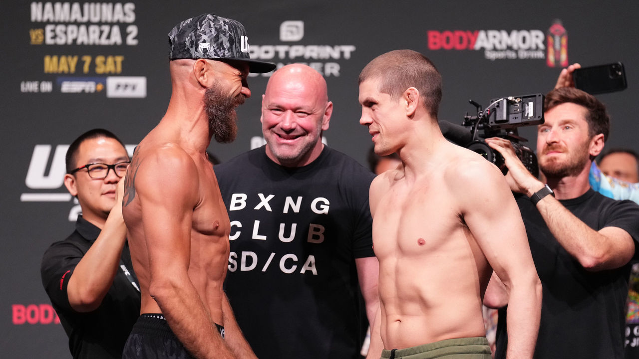 PHOENIX, ARIZONA - MAY 06: (L-R) Opponents Donald 'Cowboy' Cerrone and Joe Lauzon face off during the UFC 274 ceremonial weigh-in at the Arizona Federal Theatre on May 06, 2022 in Phoenix, Arizona.