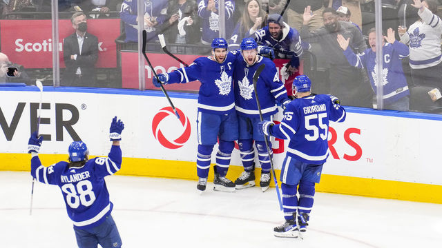 TORONTO, ON - MAY 10: Morgan Rielly #44 of the Toronto Maple Leafs celebrates his goal against the Tampa Bay Lightning with teammates John Tavares #91, Mark Giordano #55 and William Nylander #88 during the third period in Game Five of the First Round of the 2022 Stanley Cup Playoffs at the Scotiabank Arena on May 10, 2022 in Toronto, Ontario, Canada.
