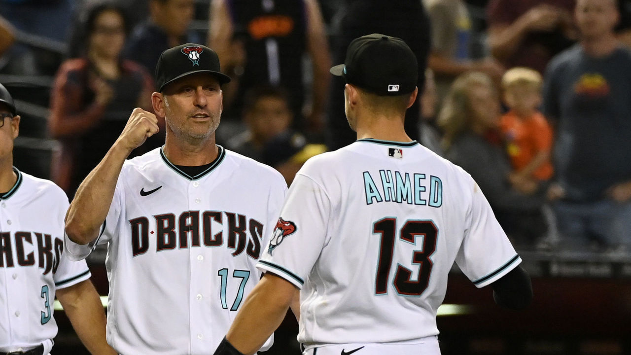 Arizona's Madison Bumgarner held back by teammates after first-inning  ejection, Arizona Diamondbacks