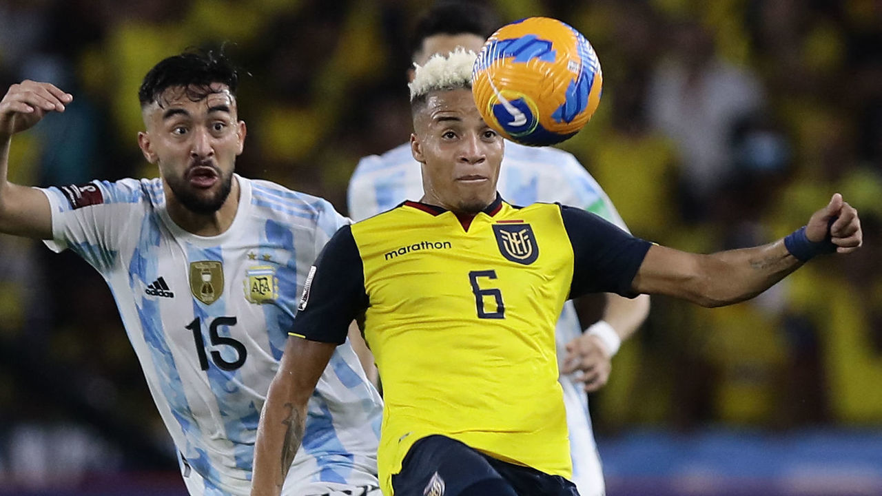 Argentina's Nicolas Gonzalez (L) and Ecuador's Byron Castillo vie for the ball during their South American qualification football match for the FIFA World Cup Qatar 2022 at the Isidro Romero Monumental Stadium in Guayaquil, Ecuador, on March 29, 2022.