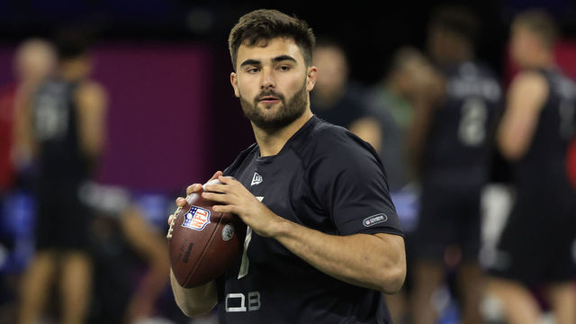 INDIANAPOLIS, INDIANA - MARCH 03: Sam Howell #QB07 of the North Carolina Tar Heels throws during the NFL Combine at Lucas Oil Stadium on March 03, 2022 in Indianapolis, Indiana.