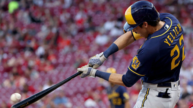 CINCINNATI, OHIO - MAY 09: Christian Yelich #22 of the Milwaukee Brewers lines out in the fifth inning against the Cincinnati Reds at Great American Ball Park on May 09, 2022 in Cincinnati, Ohio.