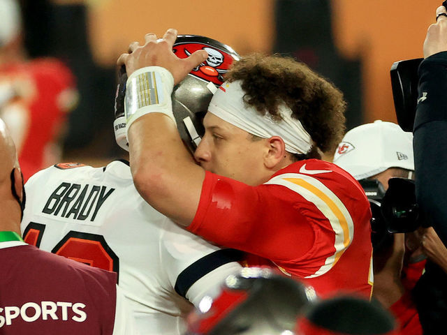 TAMPA, FLORIDA - FEBRUARY 07: Tom Brady #12 of the Tampa Bay Buccaneers and Patrick Mahomes #15 of the Kansas City Chiefs speak after Super Bowl LV at Raymond James Stadium on February 07, 2021 in Tampa, Florida. The Buccaneers defeated the Chiefs 31-9.