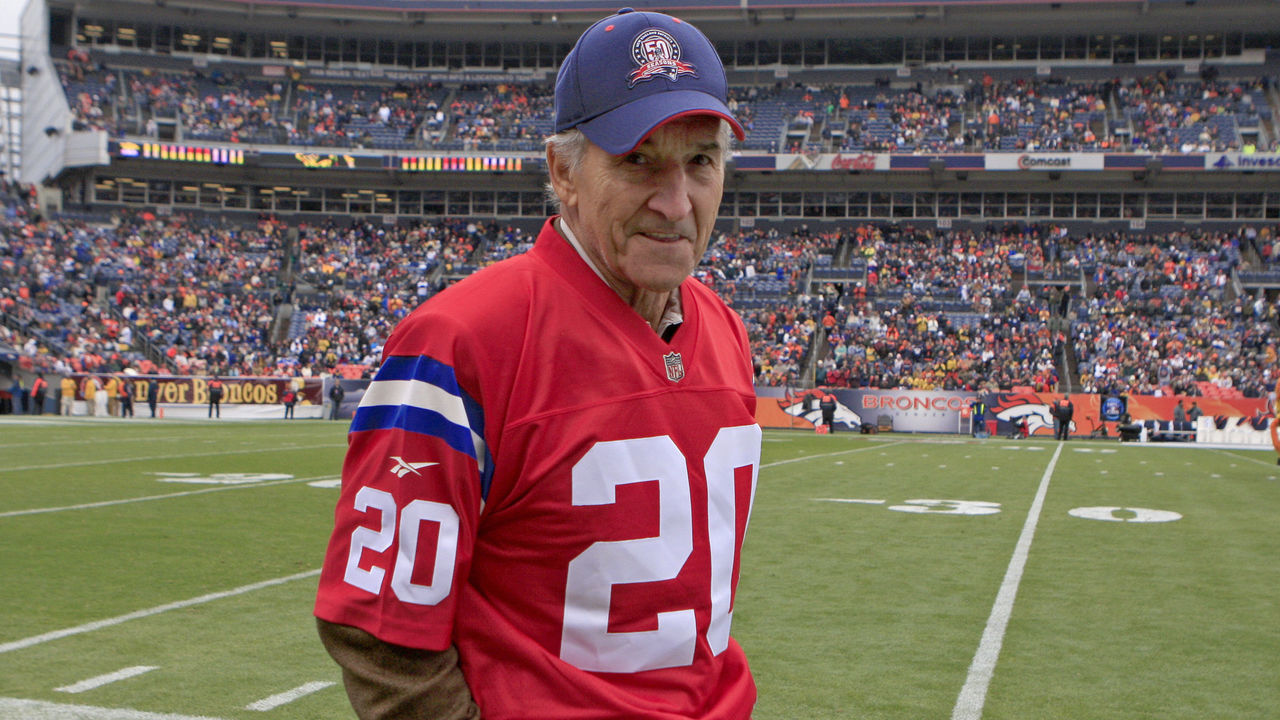 DENVER - OCTOBER 11: The New England Patriots legend Gino Cappelletti stands on the sidelines for the ceremonial coin toss before their game against the Denver Broncos at Invesco Field on Sunday, Oct. 11, 2009.