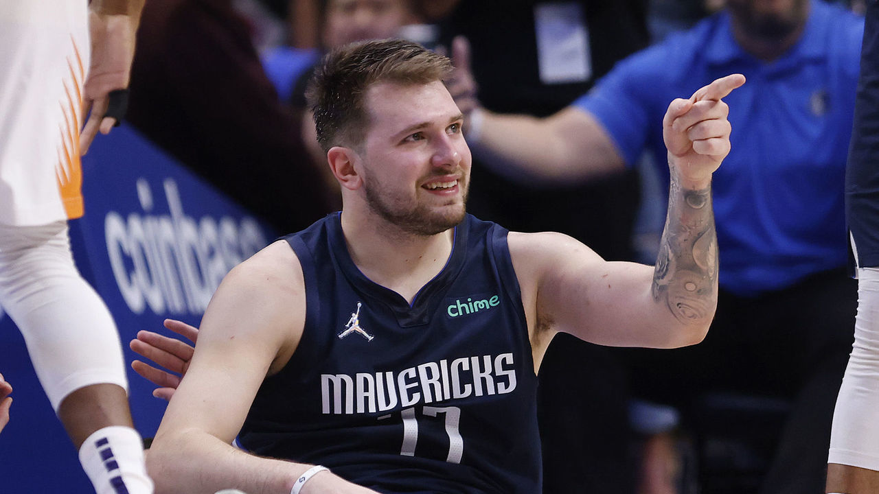DALLAS, TEXAS - MAY 12: Luka Doncic #77 of the Dallas Mavericks reacts against the Phoenix Suns in the third quarter of Game Six of the 2022 NBA Playoffs Western Conference Semifinals at American Airlines Center on May 12, 2022 in Dallas, Texas. NOTE TO USER: User expressly acknowledges and agrees that, by downloading and/or using this photograph, User is consenting to the terms and conditions of the Getty Images License Agreement.