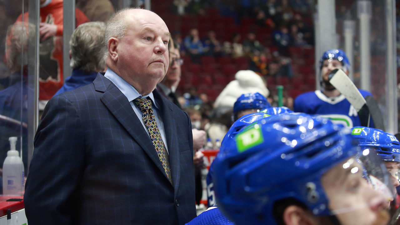 VANCOUVER, BC - JANUARY 23: Head coach Bruce Boudreau of the Vancouver Canucks looks on from the bench during their NHL game against the St. Louis Blues at Rogers Arena January 23, 2022 in Vancouver, British Columbia, Canada. "n