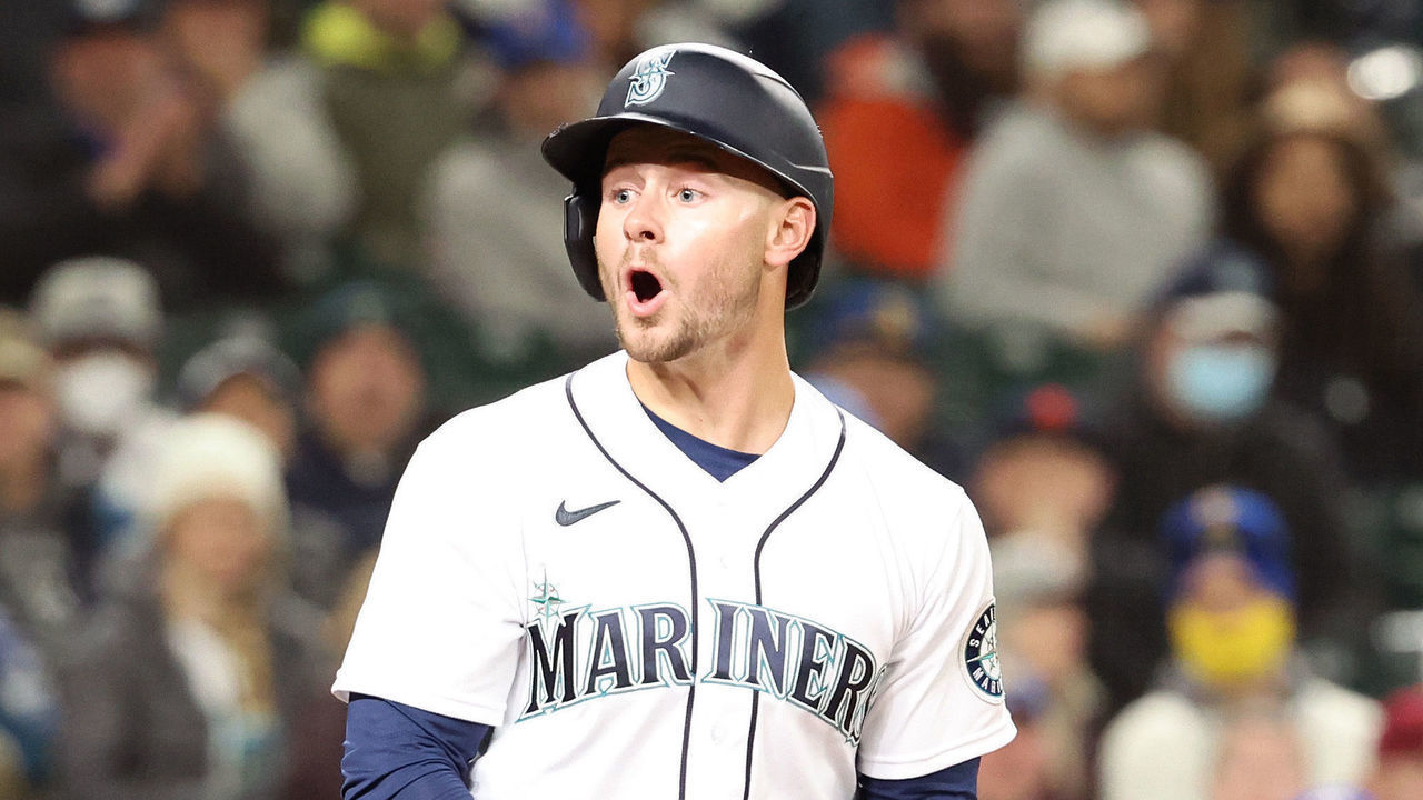 SEATTLE, WASHINGTON - APRIL 21: Jarred Kelenic #10 of the Seattle Mariners reacts after striking out against the Texas Rangers during the eighth inning at T-Mobile Park on April 21, 2022 in Seattle, Washington.