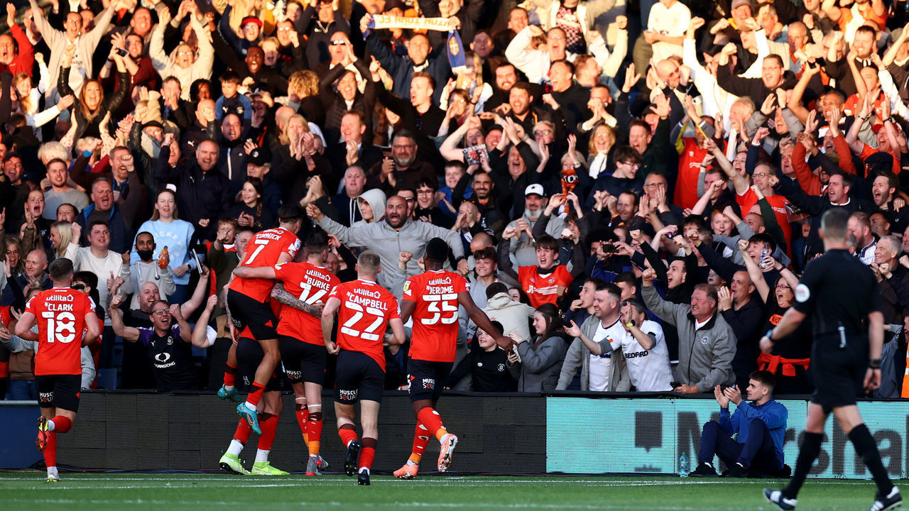 LUTON, ENGLAND - MAY 13: Sonny Bradley of Luton Town celebrates scoring his teams first goal of the game during the Sky Bet Championship Play-off Semi Final 1st Leg match between Luton Town and Huddersfield Town at Kenilworth Road on May 13, 2022 in Luton, England.