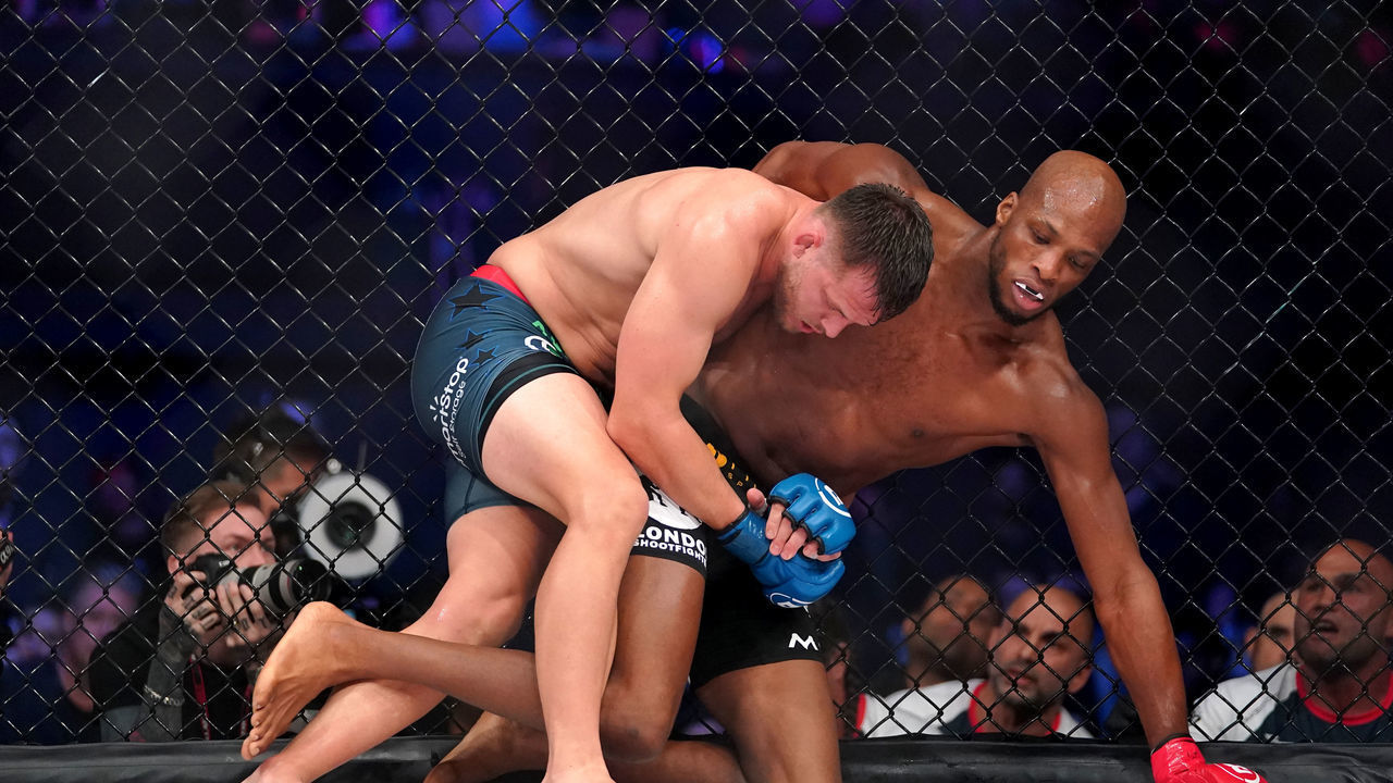 Logan Storley (left) and Michael Page in action during the Welterweight Interim World Championship fight at the SSE Arena, London. Picture date: Friday May 13, 2022.