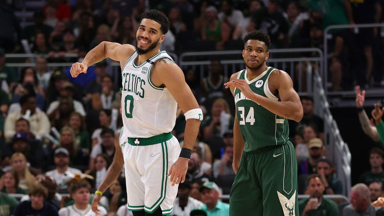 MILWAUKEE, WISCONSIN - MAY 13: Jayson Tatum #0 of the Boston Celtics celebrates a basket against Giannis Antetokounmpo #34 of the Milwaukee Bucks during the third quarter in Game Six of the 2022 NBA Playoffs Eastern Conference Semifinals at Fiserv Forum on May 13, 2022 in Milwaukee, Wisconsin. NOTE TO USER: User expressly acknowledges and agrees that, by downloading and/or using this photograph, User is consenting to the terms and conditions of the Getty Images License Agreement.
