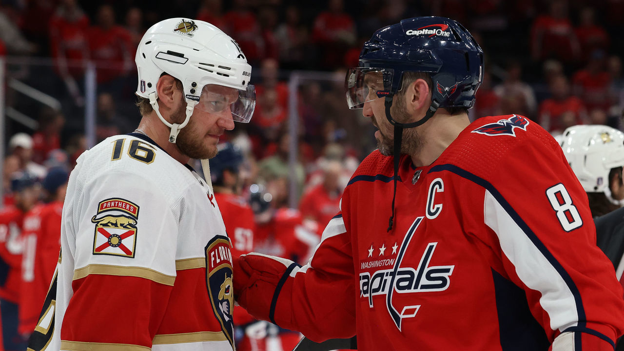 WASHINGTON, DC - MAY 13: Alex Ovechkin #8 of the Washington Capitals and Aleksander Barkov #16 of the Florida Panthers greet each other at the conclusion of Game Six of the First Round of the 2022 Stanley Cup Playoffs at Capital One Arena on May 13, 2022 in Washington, D.C.