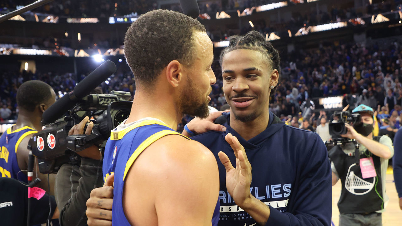 San Francisco, CA - MAY 13: Stephen Curry #30 of the Golden State Warriors embraces Ja Morant #12 of the Memphis Grizzlies after Game 6 of the 2022 NBA Playoffs Western Conference Semifinals on May 13, 2021 at Chase Center in San Francisco, California. Mandatory Copyright Notice: Copyright 2021 NBAE