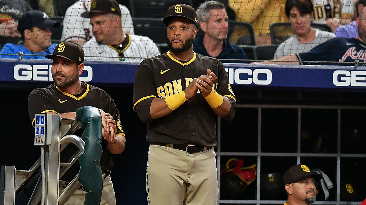 ATLANTA, GA MAY 13: Newly acquired infielder Robinson Cano (24) gestures from the dugout during the MLB game between the San Diego Padres and the Atlanta Braves on May 13th, 2022 at Truist Park in Atlanta, GA.