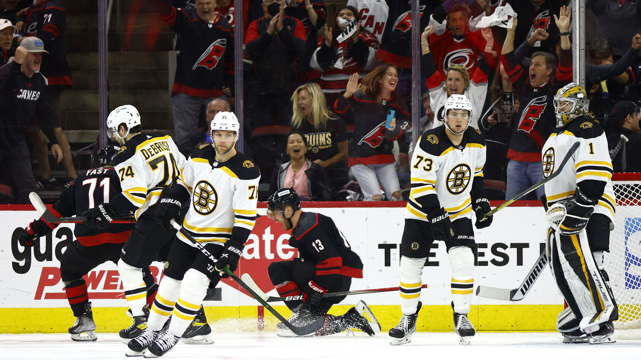 RALEIGH, NORTH CAROLINA - MAY 14: Max Domi #13 of the Carolina Hurricanes celebrates following his second period goal in Game Seven of the First Round of the 2022 Stanley Cup Playoffs against the Boston Bruins at PNC Arena on May 14, 2022 in Raleigh, North Carolina.