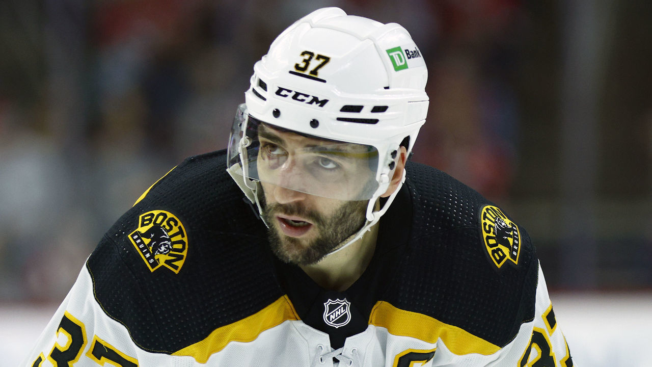 RALEIGH, NORTH CAROLINA - MAY 14: Patrice Bergeron #37 of the Boston Bruins looks on during the third period in Game Seven of the First Round of the 2022 Stanley Cup Playoffs against the Carolina Hurricanes at PNC Arena on May 14, 2022 in Raleigh, North Carolina.